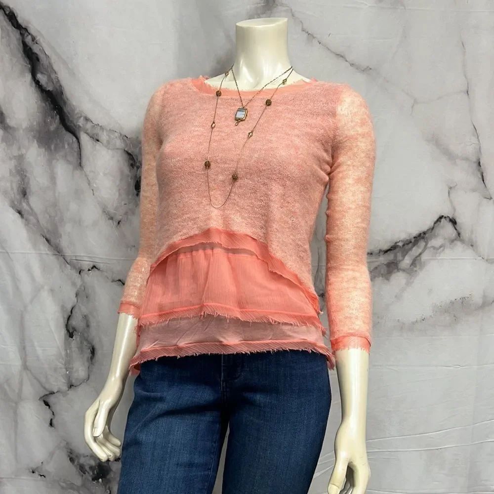 *Knitted & knotted, orange, alpaca, and wool sweater
